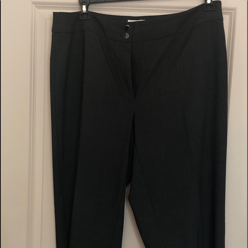 Dark gray Calvin Klein slacks, traditional fit.